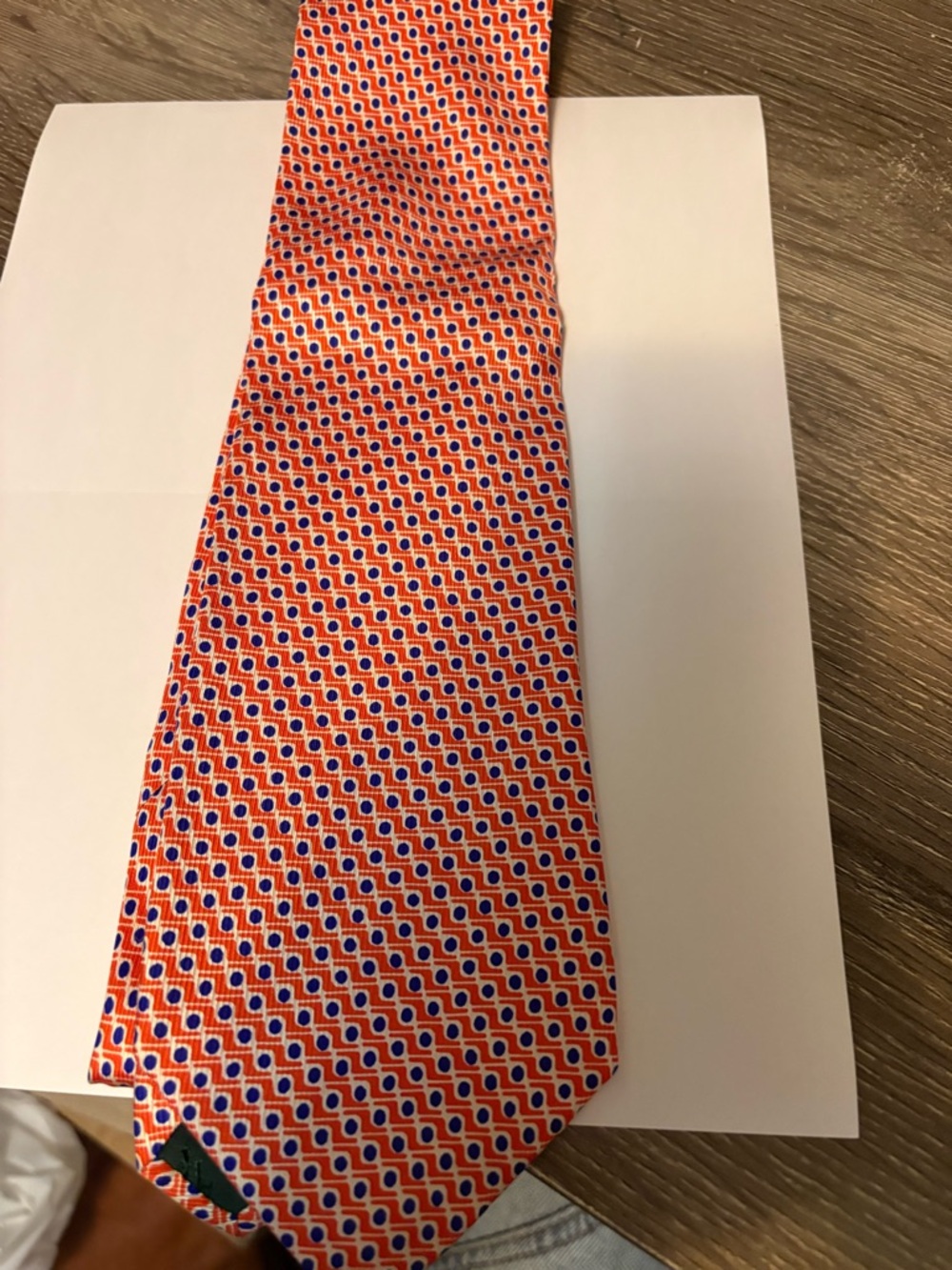 Men’s Ralph Lauren Orange and Blue Patterned neck tie.